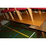 AN EARLY 20TH CENTURY OAK REFECTORY TABLE, standing on two footed shaped plank ends 244x67x76cm high