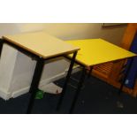 A YELLOW AND BLACK RECTANGULAR CHILD'S TABLE, 120x60x60cm high and a grey stacking table,