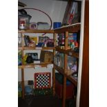 A STORE CUPBOARDS CONTENTS, including a large quantity of games and child's toys