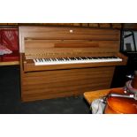 A YAMAHA E108 UPRIGHT PIANO, with walnut finish Serial No.5903420