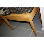 A MID 20TH CENTURY RECTANGULAR OAK VENEERED DESK WITH A DRAWER, on square tapering legs, top 60.