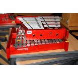 THREE PERCUSSION PLUS PERFECT PITCH GLOCKENSPEILS, with twenty two metal keys on a red wooden