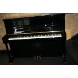 A YAMAHA V118 EBONISED UPRIGHT PIANO, Serial No. E294231 (scratches to bottom panel) 48x117cm high