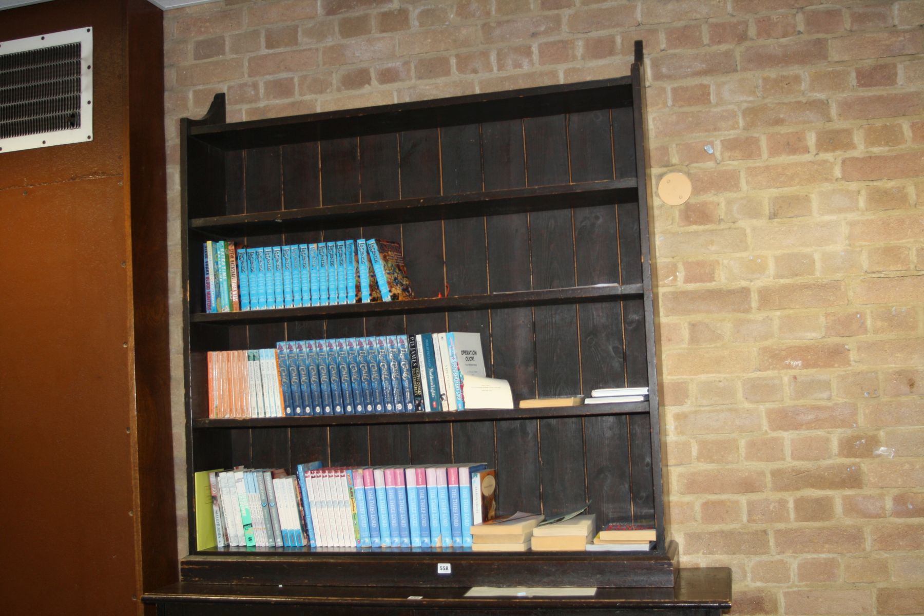 A VICTORIAN PINE BOOKCASE, 126x25x143cm high, also with books