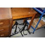 A MID 20TH CENTURY OAK DINING TABLE with hinged top, width 84cm