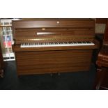 A YAMAHA E108 UPRIGHT PIANO, with a walnut case Serial No. 5880196 148x108cm high