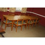 TWO MID CENTURY EXTENDING DINING TABLES, 155x86x66cm high and twelve mid Century chairs (s.d)