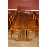 AN EARLY 20TH CENTURY OAK REFECTORY TABLE with 1'' thick solid oak top 305cm(10ft) long, 82cm (32'')