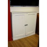 A PAINTED VICTORIAN TWO DOOR CUPBOARD, with three removable shelves and a later staple and hasp to