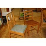 A SET OF FOUR OAK DINING CHAIRS, with upholstered lift out seat pads and a set of beech classroom
