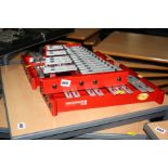 THREE PERCUSSION PLUS PERFECT PITCH GLOCKENSPIELS, with 22 metal keys on a red wooden base, 38cm