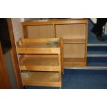 A LIGHT OAK SCHOOL TROLLEY AND A BOOKCASE, 82x55x76cm high and 120x25x91cm high respectively (s.d)