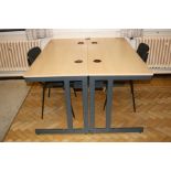 TWO OFFICE TABLES, with beechwood effect tops over grey metal legs with two cable apertures and