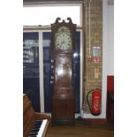 A GEORGIAN OAK 30 HOUR LONG CASE CLOCK, with a painted domed dial with a village scene inside a hood