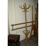 A MODERN BEECHWOOD BENTWOOD HAT AND COAT STAND