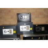 FOUR ELECTRONIC PERSONAL SAFES, two Hilka and two black