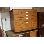 A MID CENTURY TWO PART PLAN CHEST, with six drawers, twelve brass handles and card holders