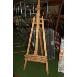 A MODERN BEECHWOOD FULLY ADJUSTABLE FOLDING ARTISTS EASEL, height adjustable from 170cm to 240cm (