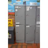 A PAIR OF GREY DOUBLE LOCKERS, 30x64x122cm high (four lockers) (s.d)