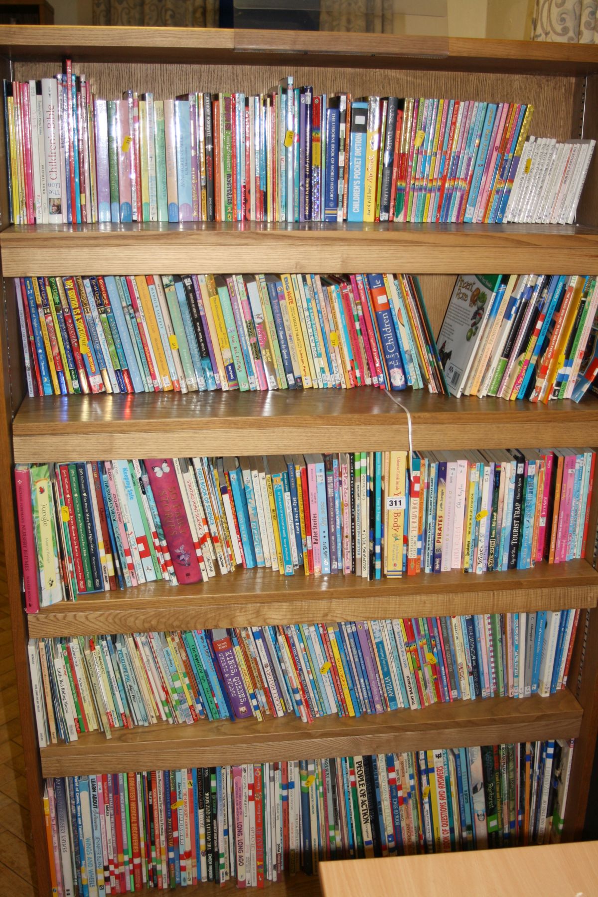 FIVE SHELVES OF CHILDRENS BOOKS