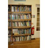 AN OAK VENEERED STANDING BOOKCASE, with four adjustable shelves, 101x35x200cm high (s.d) (content