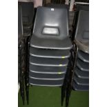 TWELVE GREY PLASTIC STACKING CHAIRS, with black tubular metal legs (s.d)