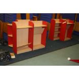 SIX CHILDS BOOKCASES, with red sides and beech effect shelves top with quadrant sides