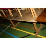 AN OAK REFECTORY TABLE, standing on footed 2'' block legs 183x77x70cm high (s.d)