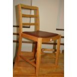 A SET OF EIGHT WOODEN LADDER BACK CHAIRS WITH PADDED SEATS (8)