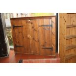 A PINE TWO DOOR CUPBOARD, with three fixed shelves 127x37x114cm high (s.d)