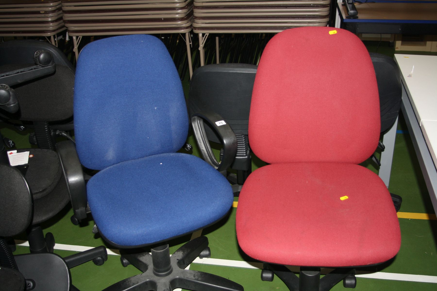 TWO ADJUSTABLE OFFICE CHAIRS, one blue with arm supports the other red with no arms (s.d)