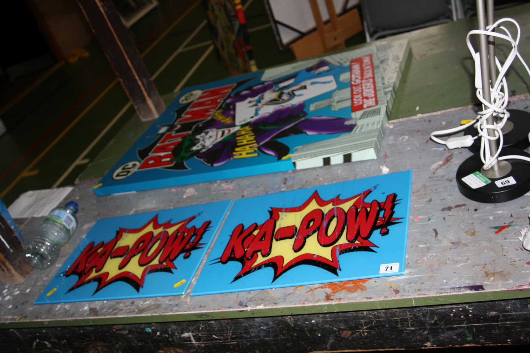 A PAIR OF BATMAN 'KA-POW' GLASS SIGNS, and a canvas print of a Batman comic cover (3)