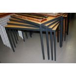 FOUR RECTANGULAR STACKABLE TABLES, tops 60cm x 120cm, height 75.5cm