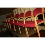A SET OF EIGHT CONFERENCE ROOM CHAIRS, with bentwood arms and dusky pink upholstery
