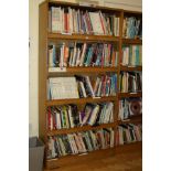 AN OAK VENEERED STANDING BOOKCASE, with four adjustable shelves, 101x35x200cm high (s.d) (content