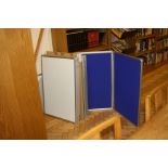 THREE FOUR-FOLD DISPLAY STANDS, with facility to comprise them as one large display stand, blue