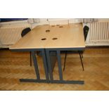 TWO OFFICE TABLES, with beechwood effect tops over grey metal legs with two cable apertures and