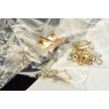A SELECTION OF JEWELLERY PARTS AND FITTINGS, to include four ring clips, all stamped 9ct, three
