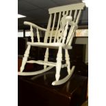 A CREAM PAINTED ROCKING CHAIR