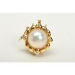 A 14CT PEARL AND DIAMOND CLASP, the push piece clasp with central pearl within a scalloped