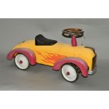 A MODERN GOODBOYS SPEEDSTER HOT DOG RIDE ON SCOOT-ALONG CAR, of metal and plastic construction, some