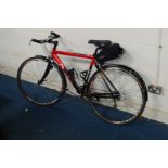 A RED APEX PERKS ROAD BICYCLE