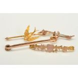 FOUR EARLY 20TH CENTURY BROOCHES, to include a plain bar brooch, pin rolled gold, a brooch design as