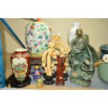 A GROUP OF TWELVE MOSTLY CHINESE ITEMS, including deity figures, a soapstone carving, a jar and