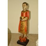 A MODERN CARVED HARDWOOD AND PAINTED DEITY, incorporating black wooden plinth, total height