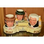 A ROYAL DOULTON STAND 'THE PICKWICK COLLECTION', with three advertising character jugs, 'Mr