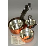 A GRADUATED SET OF FIVE FRENCH COPPER PANS