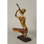 A MODERN BRONZED FIGURE, depicting Eastern man squating playing musical instrument, height 28cm