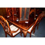 A REPRODUCTION MAHOGANY EXTENDING DINING TABLE, on additional leaf, extended width 206cm x closed