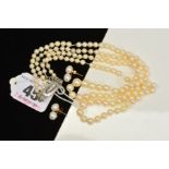A CULTURED PEARL DOUBLE ROW NECKLACE AND A PAIR OF EARRINGS, the necklace designed as two rows of